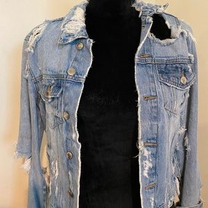 Super Distressed Light Wash Denim Jacket from Zara